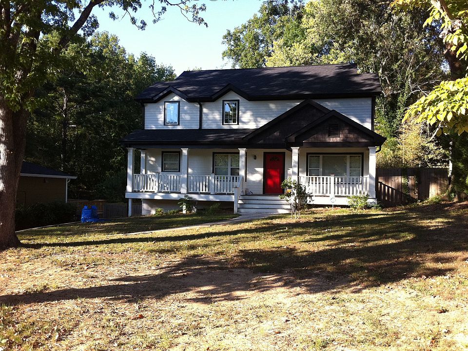 Front view after remodel, before new landscape/driveway
