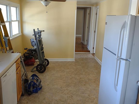 kitchen area, dining area and hall to living area