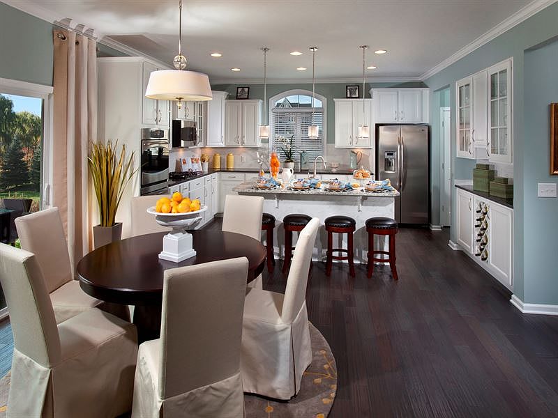 Gourmet Kitchen with White Cabinets, Granite Countertops and Stainless Steel Appliances