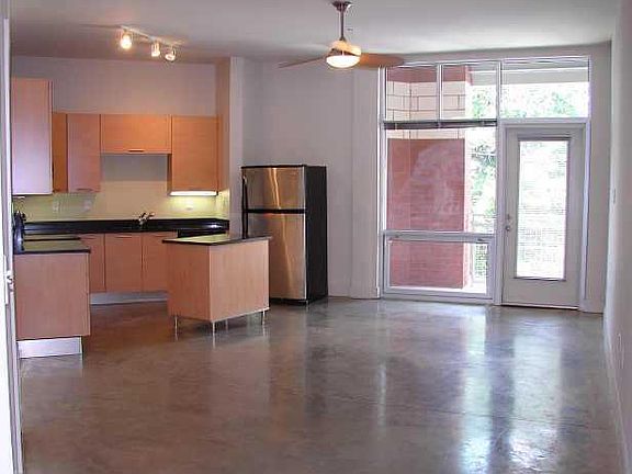 Kitchen, living room and covered balcony