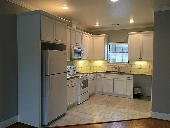 Kitchen with refrigerator, stove, dish washer