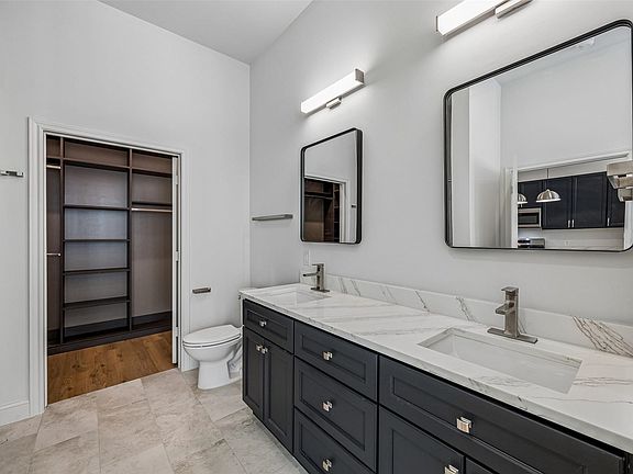En-Suite bathroom, and walk-in Closet.