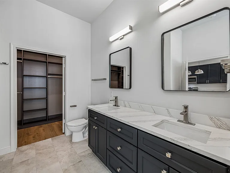 En-Suite bathroom, and walk-in Closet.