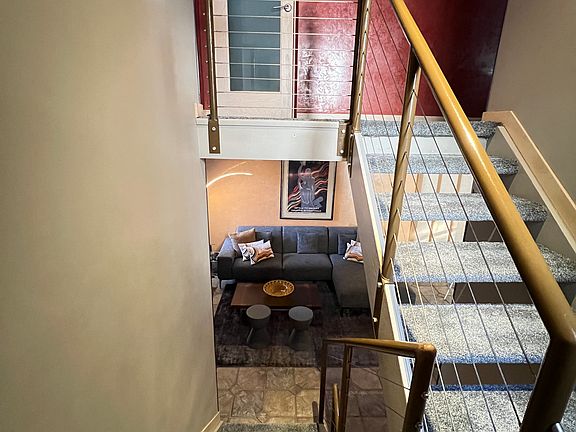 STAIRCASE down to living and up to landing