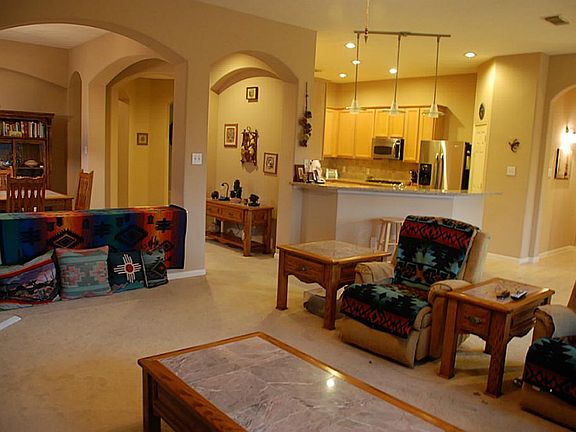 Spacious Family Room flows into the kitchen, dining, an breakfast area.