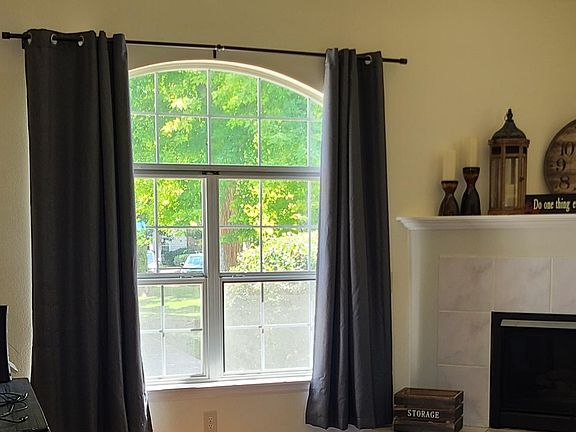 large front window looking out onto community courtyard