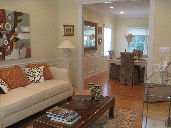 FORMAL LIVING LEADS INTO FORMAL DINING ROOM