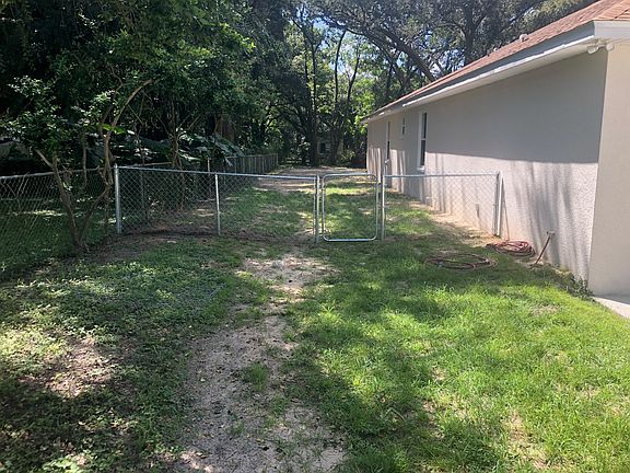 left-fenced in backyard