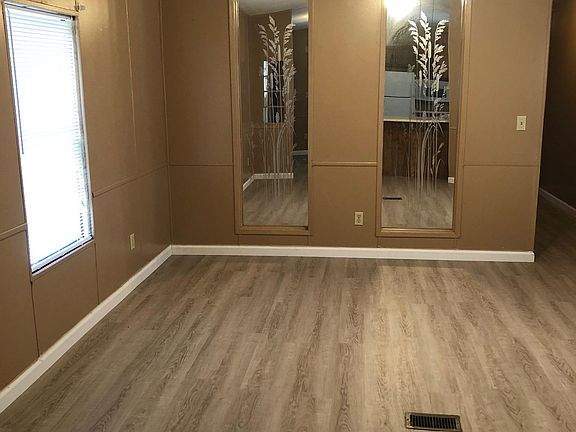 Living Room with new vinyl plank flooring throughout home!