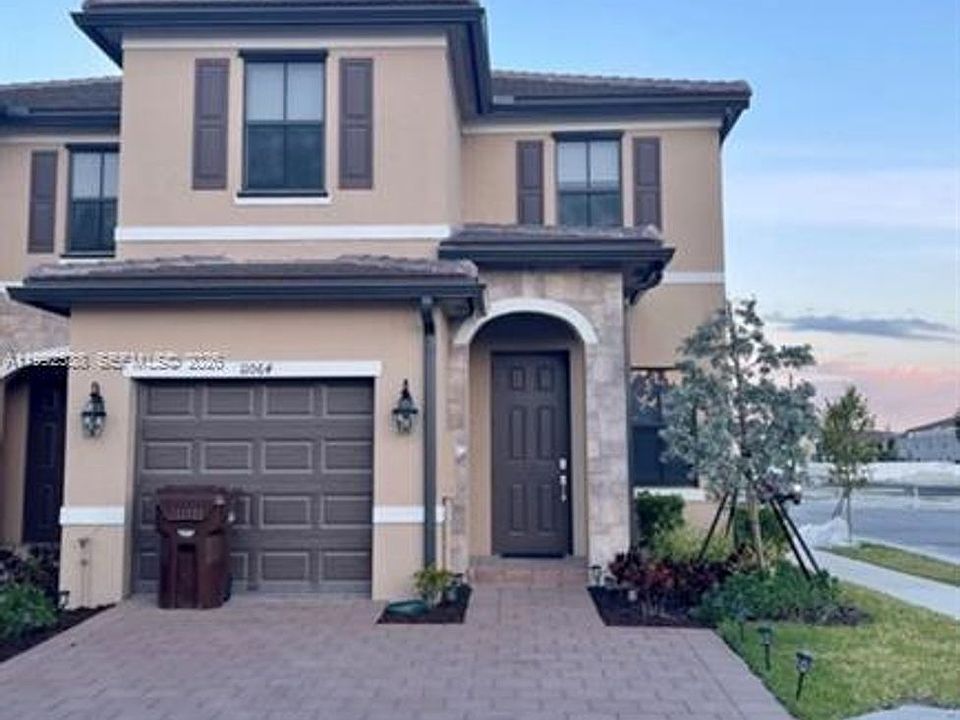 1st image of 11064 W 33rd Way #Townhouse 11064