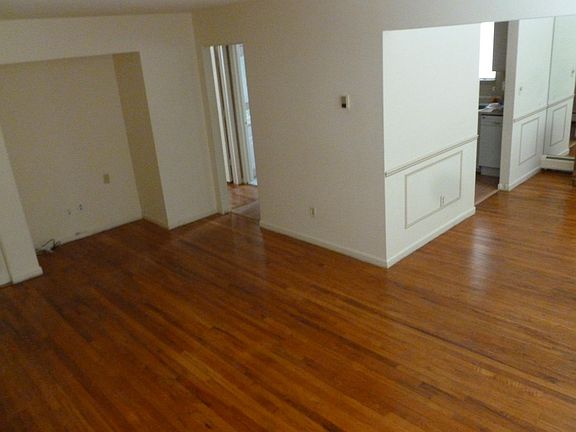 Living room/dining room to right. Kitchen access through both living room and dining room.