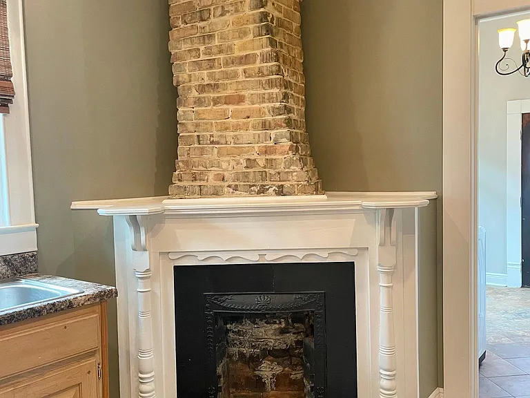 Exposed brick fireplace