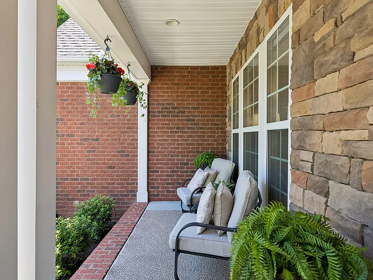 Enjoy a cup of coffee or evening cocktail on your covered front porch!