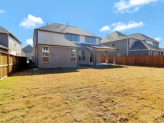 Come and see this spacious backyard with its beautiful covered patio. There is plenty of room for t