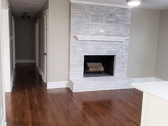 Whitewashed fireplace