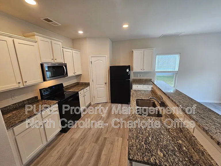 7015 Amberly Hills Rd — Photo 7