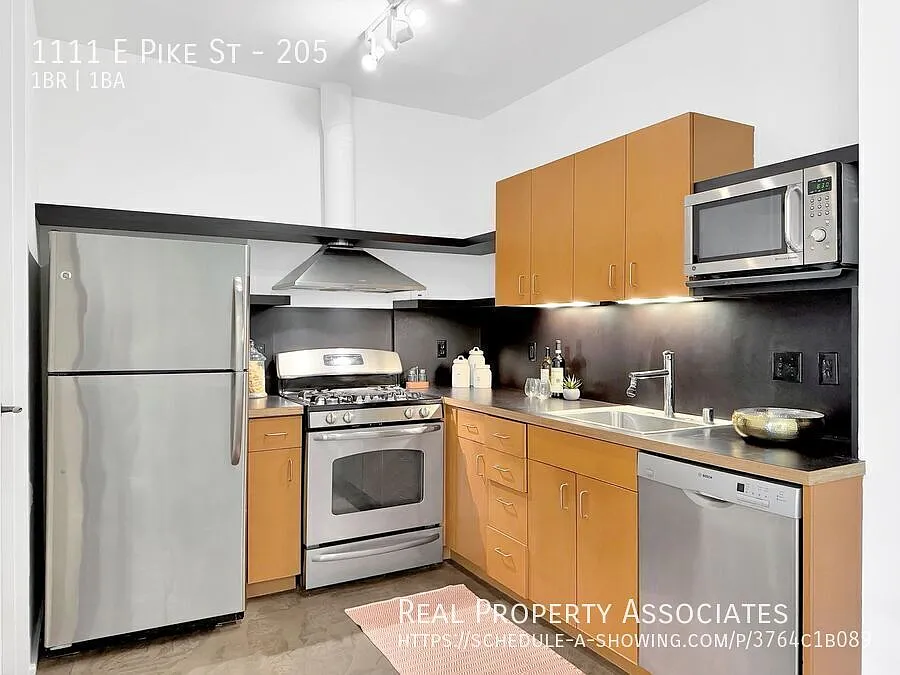 Building Photo - 1111 E Pike St #205
