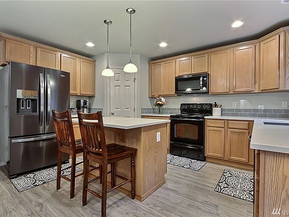 Quartz Countertops and appliances stay! 