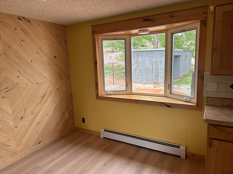 Large bay window provides natural light