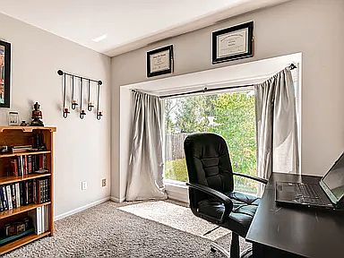 bedroom with blue doors/ office