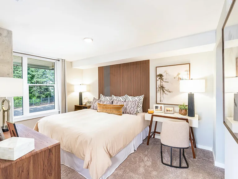 Soft carpet underfoot in your dreamy modern bedroom.