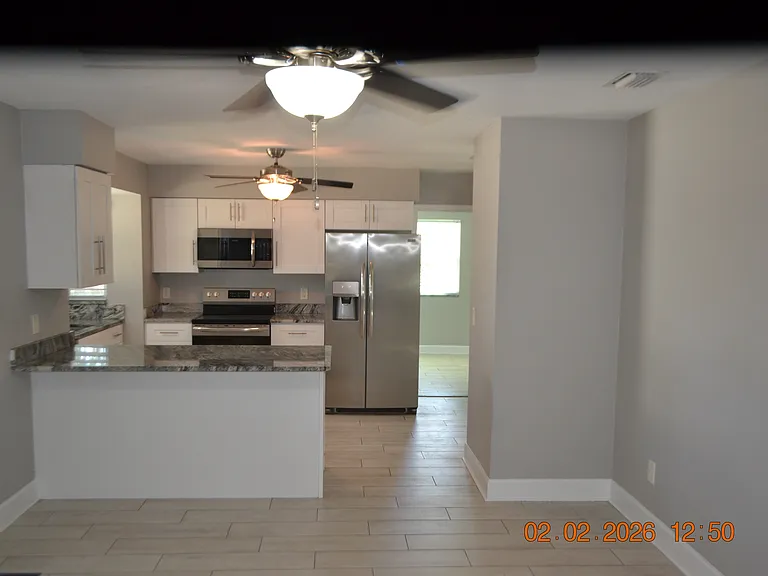 6204 W Knights Griffin Rd — Photo 6
