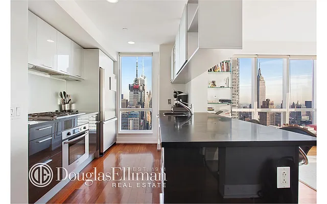 Sold by Douglas Elliman | media 12