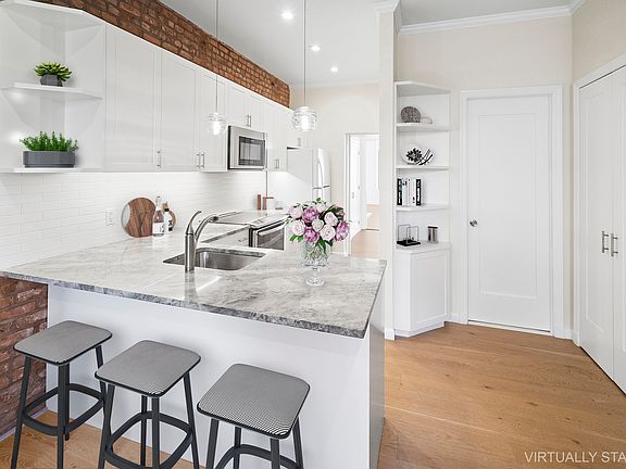 2nd image of 306 E 15th St APT 3R