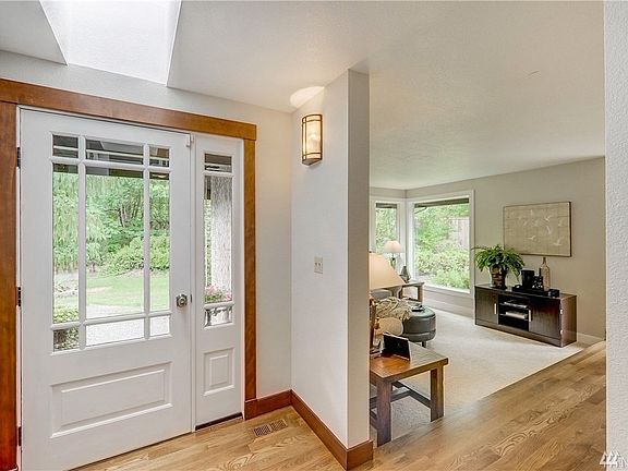 Welcome home. The entry way has a skylight and is open and bright. 