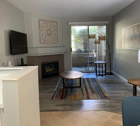 Living room and sliding glass door to deck