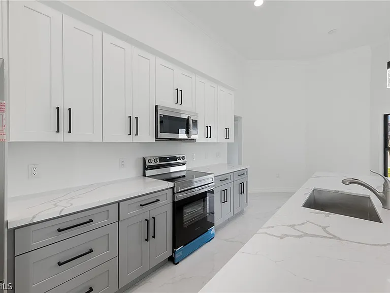 1413 NE 15th Terrace Cpe — Photo 12