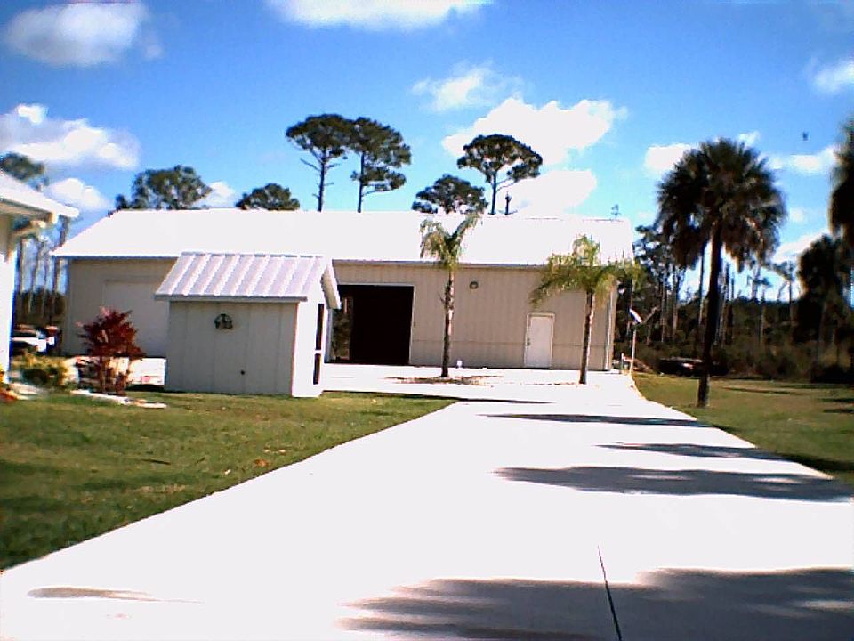 Back Garage with water shed in front