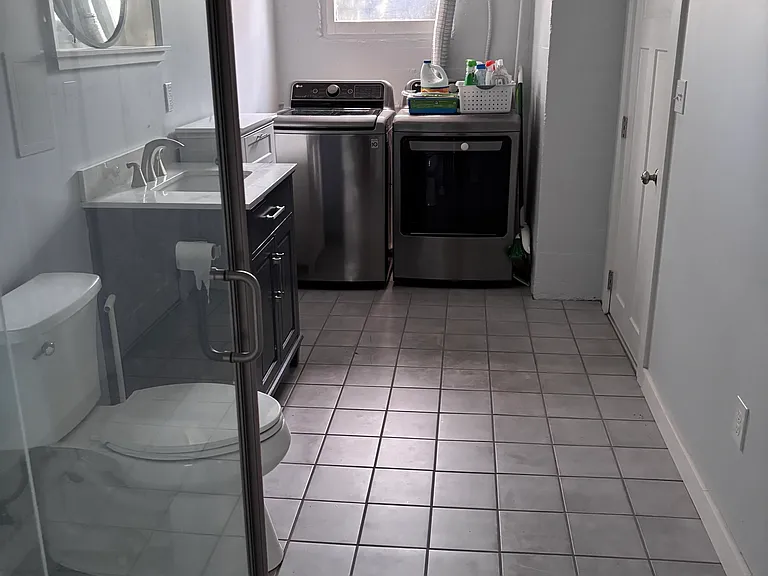 Bathroom with washer dryer