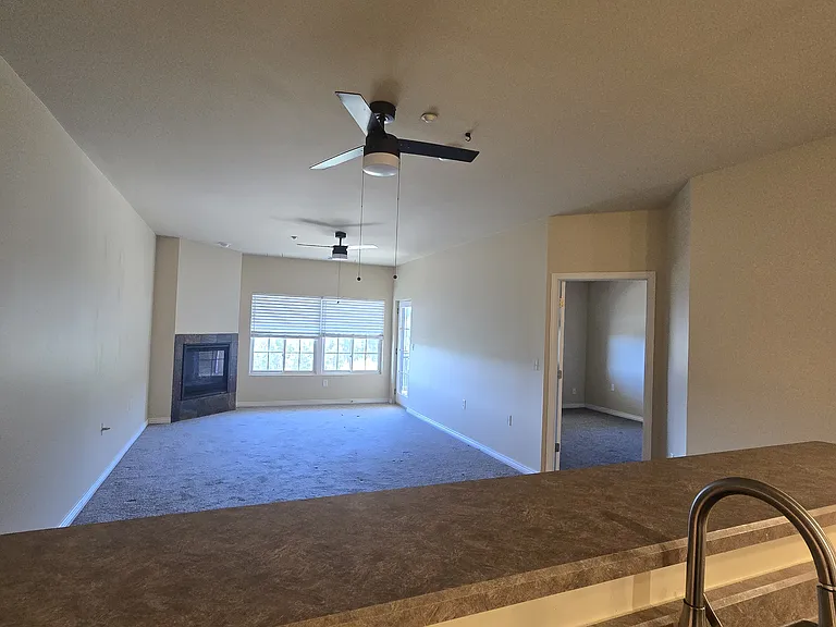 Eating area and Living area from Kitchen. Gas Fireplace.