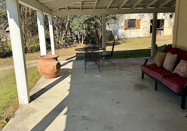 Outdoor Sitting Area off Back Porch