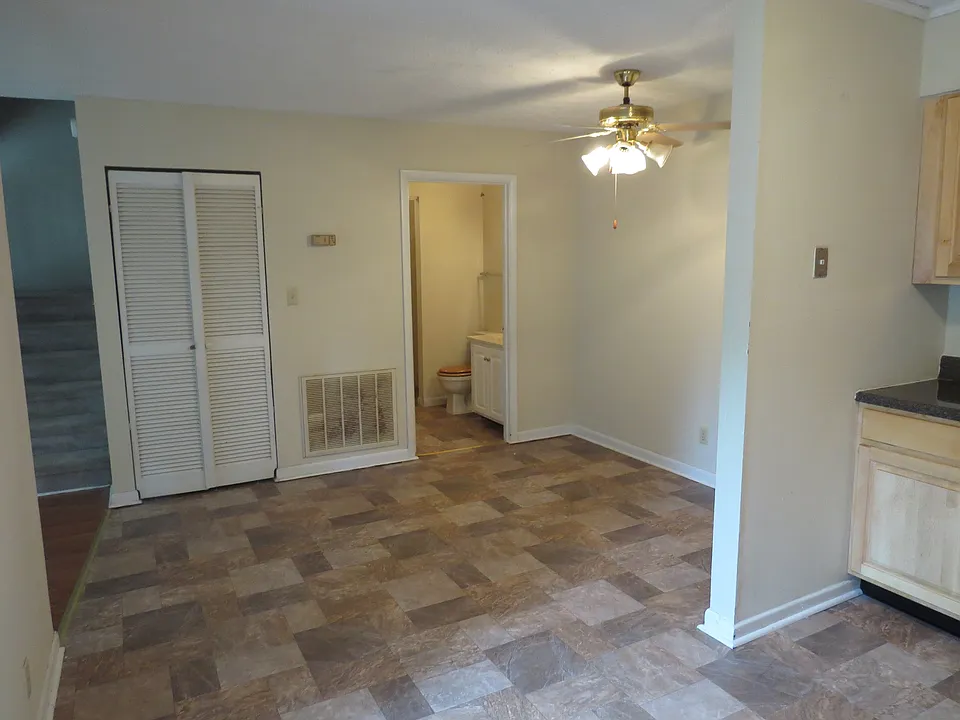 View of dining and 1/2 bath (laundry)