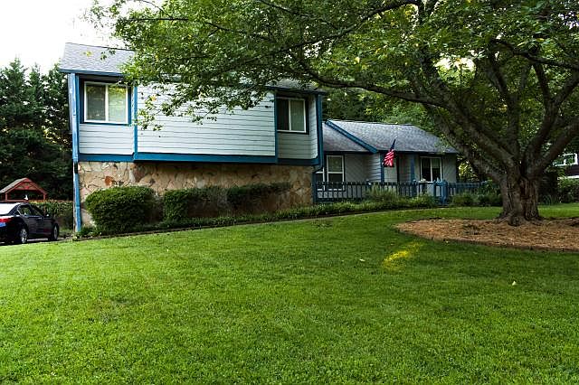 Two bedrooms are on the left side of house and the living ro
