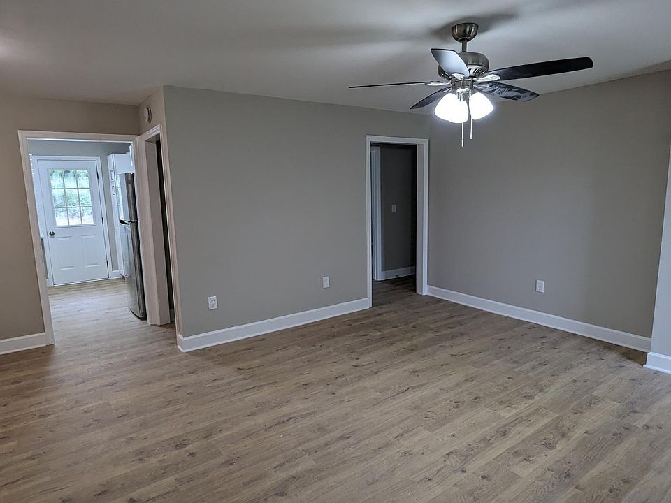 This spacious living/dining area has lots of natural light!