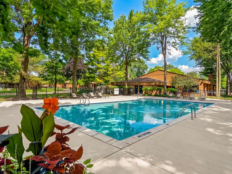 Heated pool with sundeck at Eastwood Village Apartments in Clinton Township, MI.