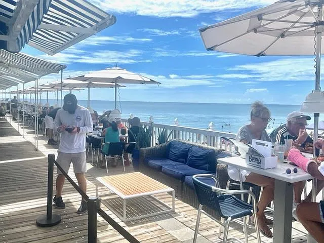 Benny's on the beach, a five minute drive, or 8 minute bike ride. Open air, ocean front dining, and live music almost every night of the week.