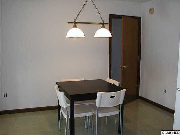 Door to master bedroom off of dining area