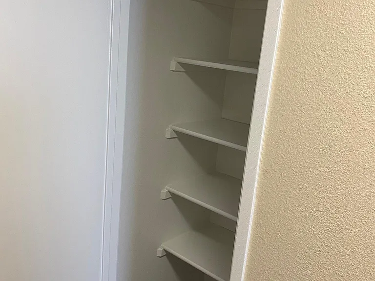 downstairs 2 bedroom - linen closet