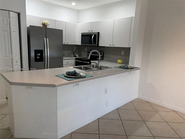 5743 NW 114th Path #106 — Photo 6