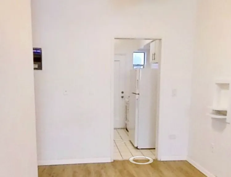 Entrance from dining to the kitchen