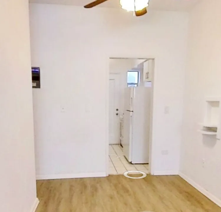 Entrance from dining to the kitchen
