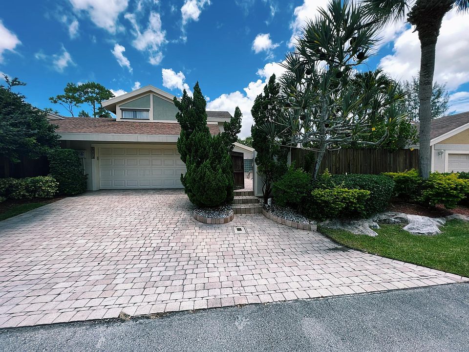 Front view of home; 2 car garage; 2 car driveway