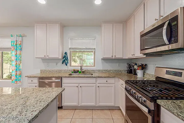 8216 W Albeniz Pl — Photo 11