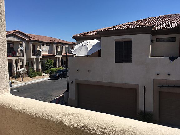 Looking east from the small patio off one of the two master bedrooms.