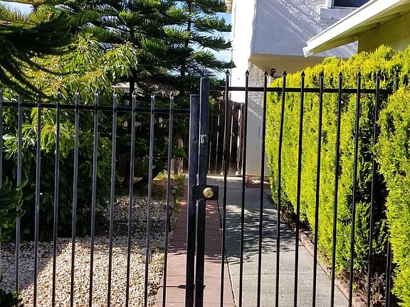 Private and secure court yard at front entry