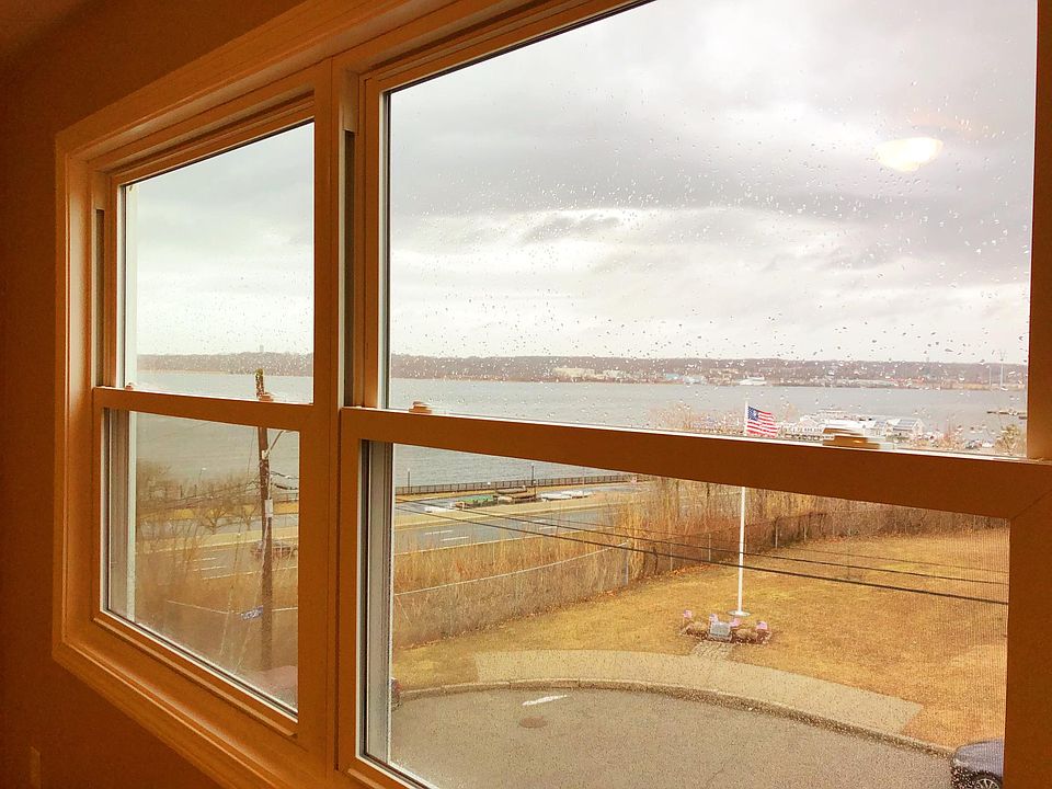 Views of the river and park directly in front of the building.